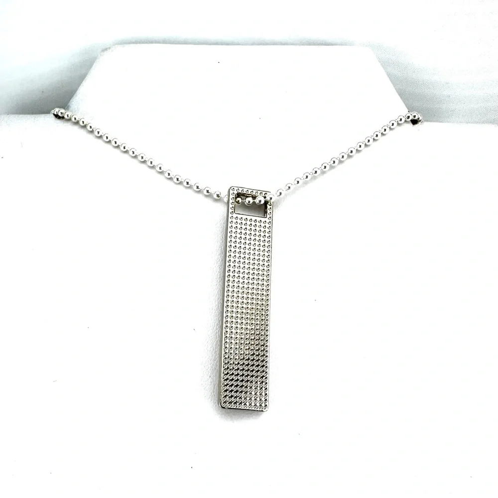Prada charm w/bonus gift. AUTHENTIC White and silver.